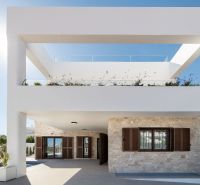 2-bedroom apartment in Pulpí with a pool, terrace, and modern architecture.