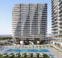 A holiday apartment in Canet d'En Berenguer with a garden and a pool near residential towers.