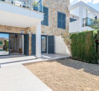 Holiday apartment in Cala Murada Mallorca with a terrace, stone walls, and a garden.