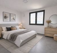 Elegant bedroom in a family house with elegant decor and a cozy atmosphere.