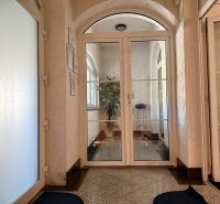 Entrance hall with glass doors and a plant, Unusual properties.
