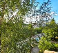 A view of greenery and sidewalks from a 2-room apartment on Jánošíkova Street in Košice (Juh).