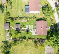 A family house in Bílkova Humence with a large garden and neatly arranged spaces.
