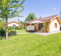A family house in Bílkove Humence with a garden and a terrace with seating.