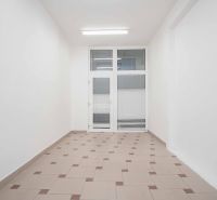 Offices with ceramic tiles and white walls for a pleasant working environment.
