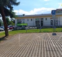Commercial premises in Žiar nad Hronom with parking and natural surroundings.