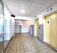 The entrance hall with mailboxes and elevators on Ipeľská Street in Podunajské Biskupice.
