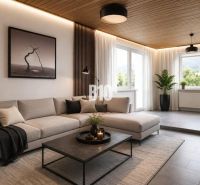 A stylish living room in a family house with a comfortable sofa and a view of nature.