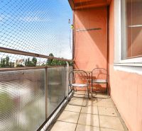 A balcony in a 2-room apartment on Rovníková Street in Bratislava - Ružinov with simple furniture.