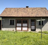 A family house on Štúrova Street in Sučany, with a grassy plot and flowers.