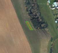 Aerial view of agricultural and forest land near Čierny Balog, with a marked plot.