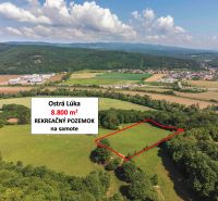 Recreational plots in Ostrá Lúka surrounded by nature and green landscape.