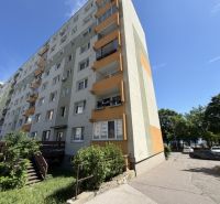 Apartment building on Dudvážska Street in Bratislava - Podunajské Biskupice with balconies and greenery.