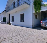 A family house in Žabokreky on Žabokreky Street with a garage and a paved courtyard.