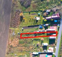 A residential plot in Radnovce surrounded by nature, close to the road.
