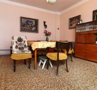 Living room in a family house with retro furniture and decorations.