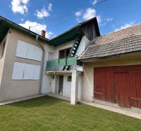 Family house on Na záhumnie Street in Hrochoť, with a green lawn garden.