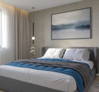 Bedroom in a family house with a large bed and a decorative wall.