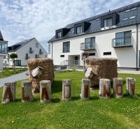 A recreational apartment on Mincova Street in Liptovsky Mikulas with an exterior decorated with bales of straw.