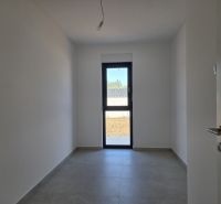 A simple room with glass doors in a 4-room apartment.