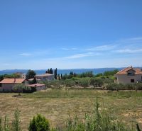 View of the coastline and houses near the sea in Privlaka.