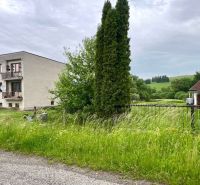 A building with balconies in the Recreational Lands in Gôtovany, surrounded by greenery and trees.