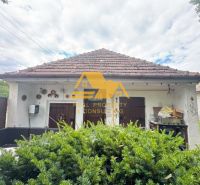 A family house in Imeľ on Imeľ Street with a classic sloped roof and decorations.