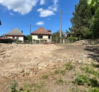 Residential plots in Rákoš with a view of family houses and greenery.