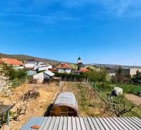 A view of the gardens at Lehárova 2 in Nitrianske Hrnčiarovce with family houses.
