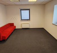 Office with a red sofa, gray carpet, two windows, Záhradnícka, Komárno.