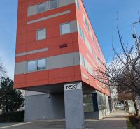 Administrative building with light stripes located on Záhradnícka Street in Komárno. Offices.