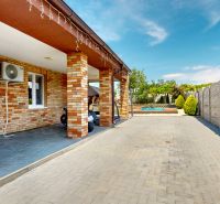 Family house in Lehota on Lehota Street, terrace with adjacent garden and swimming pool.