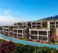 A holiday apartment in Agia Eirini with a sea view, surrounded by greenery and palm trees.