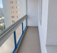 A glazed balcony of a 3-room apartment with a view of the surroundings in Bratislava - Karlova Ves.