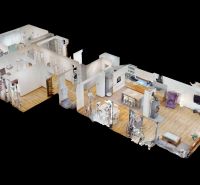 Floor plan of a family house with a wooden decor floor and furnishings of the kitchen and living room.