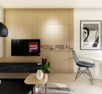 Interior of a 2-room apartment with a wooden decor floor, a table, and an art painting.