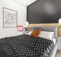 A bedroom with black cabinets, a gray bed, and decorative vases in a two-room apartment.