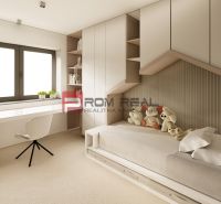 Children's room in a 4-room apartment, white bed, toys, desk, and window.