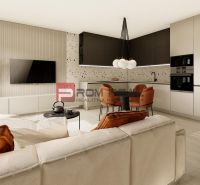 Living room with kitchen in a 3-room apartment with a wooden decor floor and brown accessories.