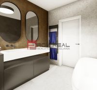 A bathroom in a 4-room apartment with two oval mirrors and a white bathtub.