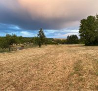 Agricultural and forest land in Krupina with a beautiful view of the surrounding nature and sky.