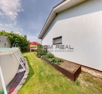 A family house in Hrubý Šúr with an outdoor pool and a garden.