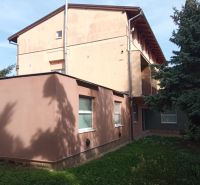 A building among trees in Patince, suitable for hotels and guesthouses.