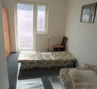 A simple room in hotels and guesthouses with a window and two beds.