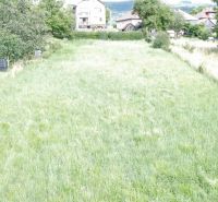Greenery and houses in Vlachovo, an ideal place for residential plots.