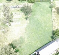 Aerial view of a green plot in Vlachovo, suitable for living.