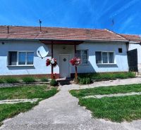 A family house on Kapitána Nálepku Square in Vráble surrounded by a well-maintained lawn.