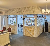 Hotel interior with decorative elements, vaulted ceilings, and ambient lighting.