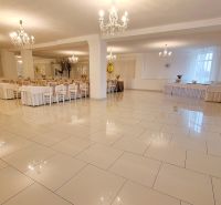Luxury hall with white tiles and crystal chandeliers in hotels and guesthouses.