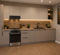 A kitchen in a family house with a wooden decor floor and modern cabinets.